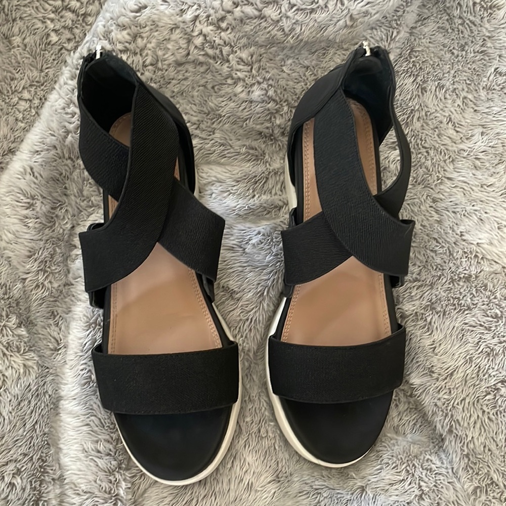 Black strapy wedge.